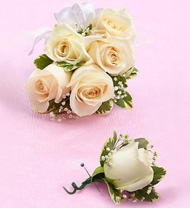 Order white corsage and boutonniere from 1800flowers.com!
