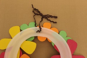 How to Loop Ribbon Through a Thanksgiving Flower Wreath How to Loop Ribbon Through a Thanksgiving Flower Wreath