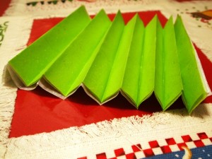 Stack of Christmas Tissue Paper Folded Like an Accordion Stack of Christmas Tissue Paper Folded Like an Accordion