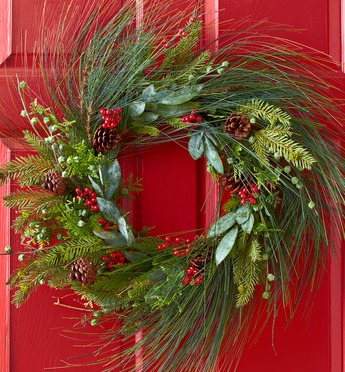 Pine Wreath Hanging on a Front Door
