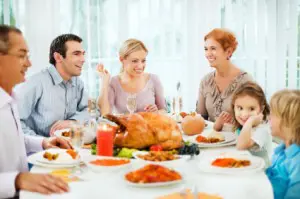 Family Talking During Thanksgiving Dinner