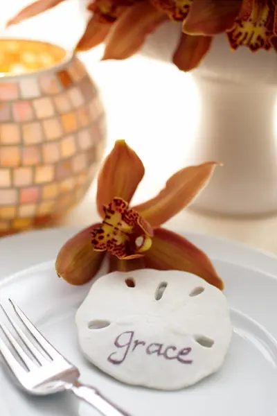 thanksgiving table settings with sand dollar place card
