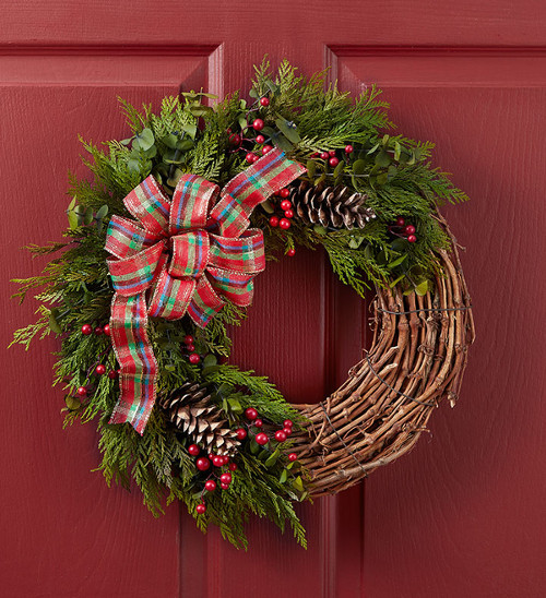 christmas wreath on red door