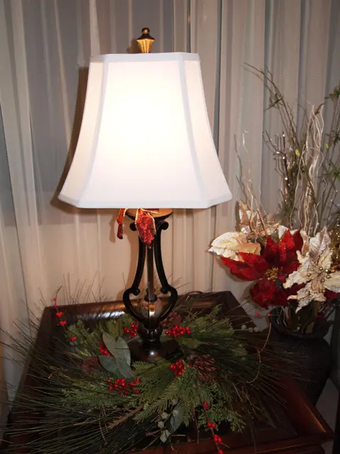 Table Lamp Decorated With a Pine Wreath