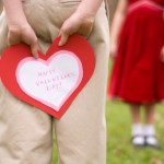 Boy Hiding Valentine's Day Card From Girl