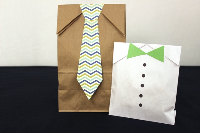 A photo of diy gift bags with Gift Bags Decorated With Paper Ties and Buttons