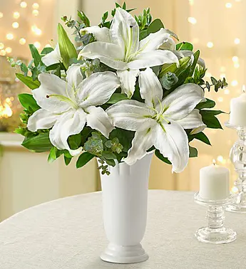 all about lilies with all white lily bouquet