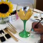 Painting sunflower on wine glass