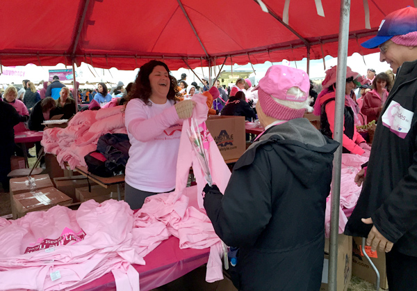 making-strides-against-breast-cancer-walk-jones-beach-ny-handing-out-fowers