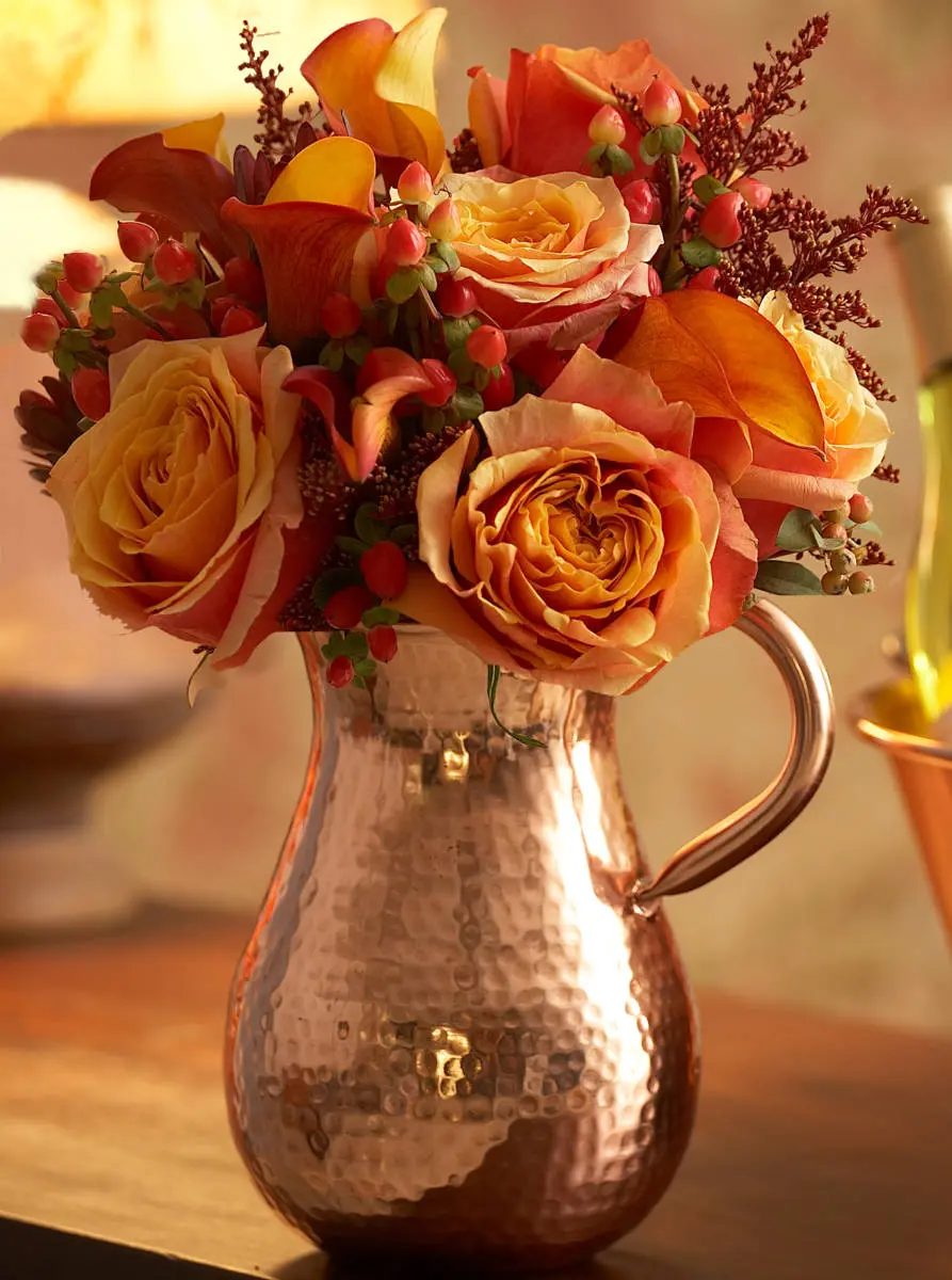copper-water-pitcher-rose-arrangement