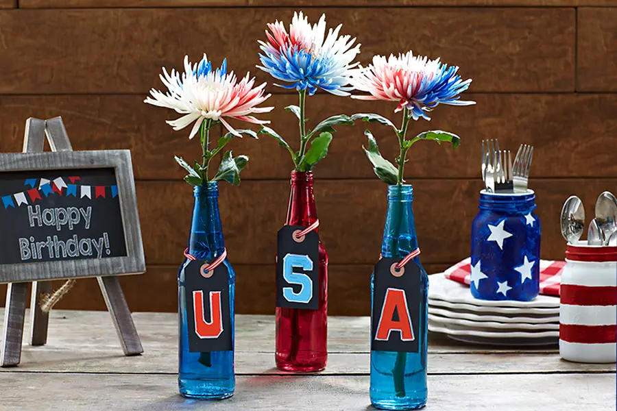 4th of july crafts with glass bottles with red, white, & blue flowers