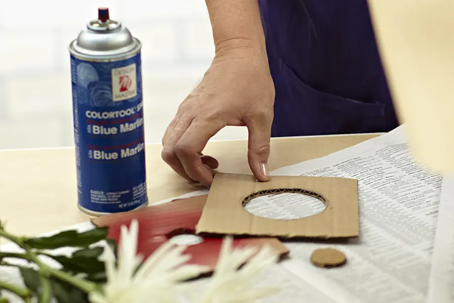 painted flowers with Cut Larger Hole in Cardboard 