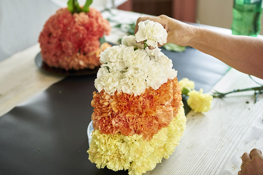 candy corn decorations with Finish off with white carnations