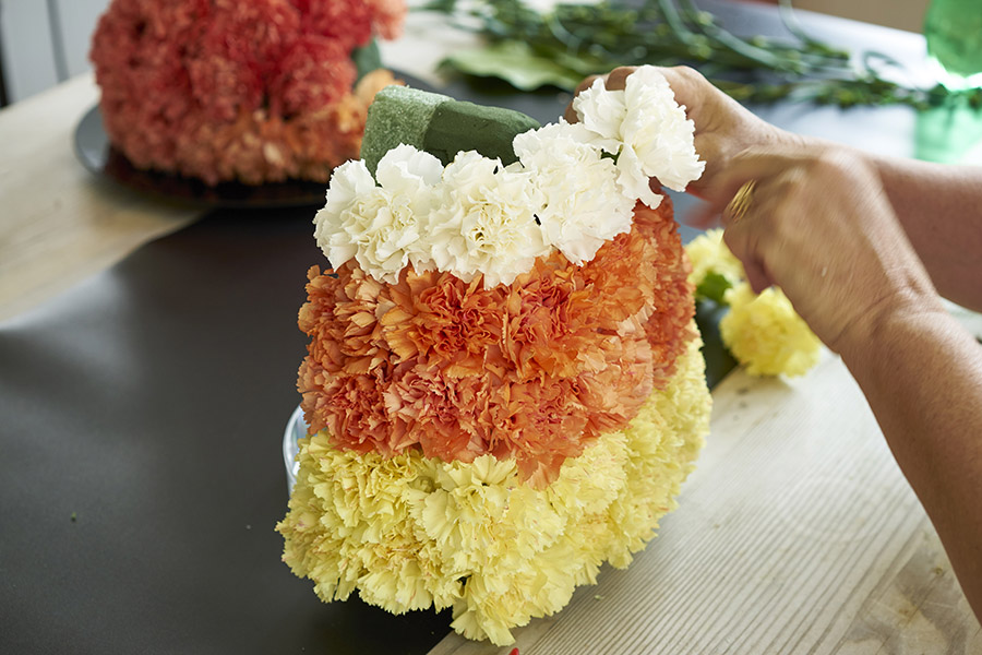 candy corn decorations with White Carnations Candy Corn Arrangement