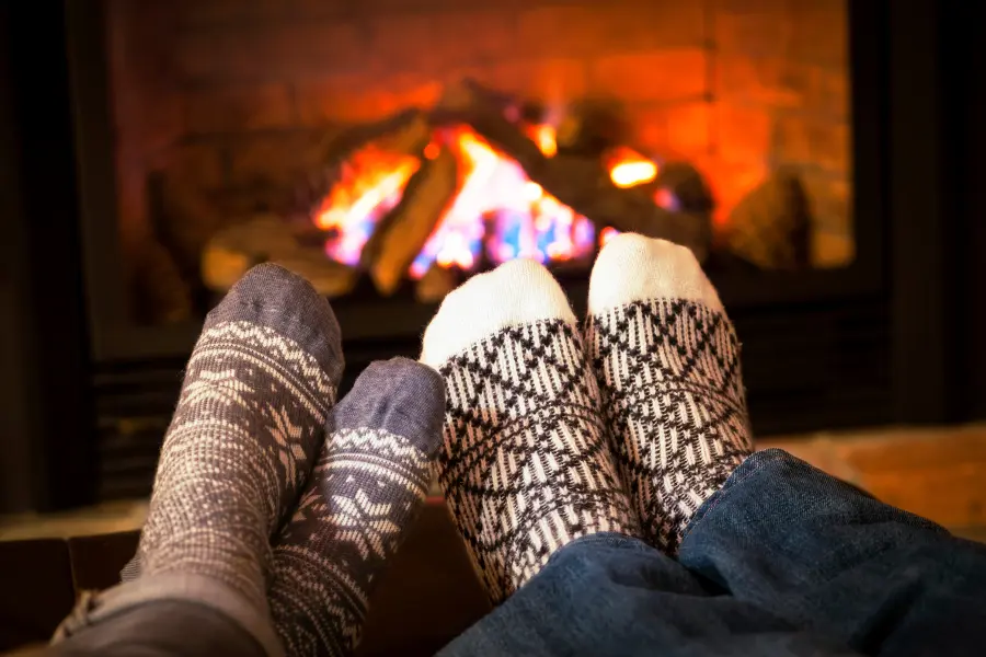 winter with  Fuzzy Socks by the Fireplace