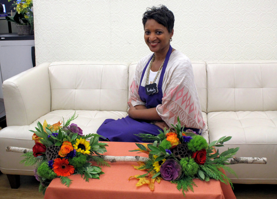 Kim with her finished birch branch centerpiece