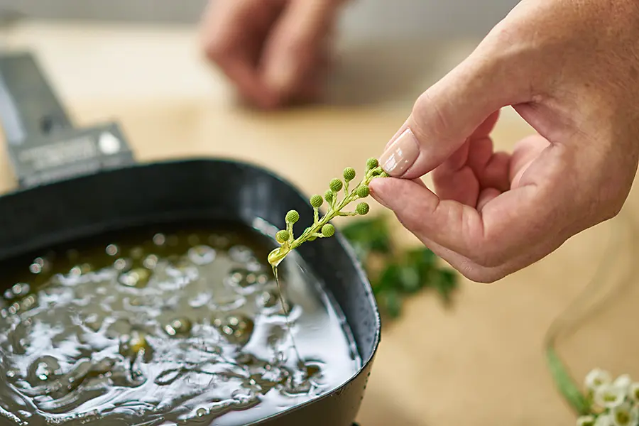 Dip stems into hot wax