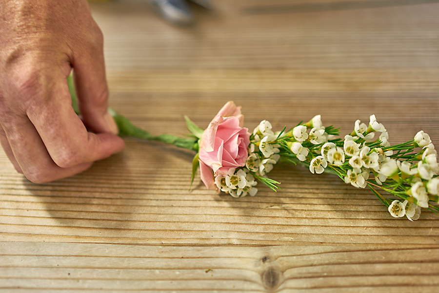 Wrap floral tape around all of the wire stem