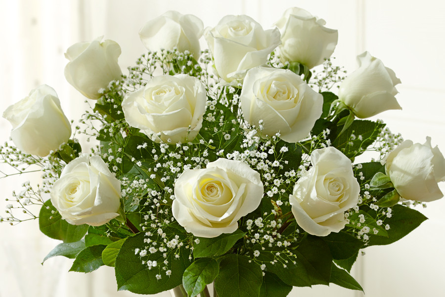 The meanings of flowers vary dramatically. White flowers such as the white roses pictured here, often symbolize purity and innocence.