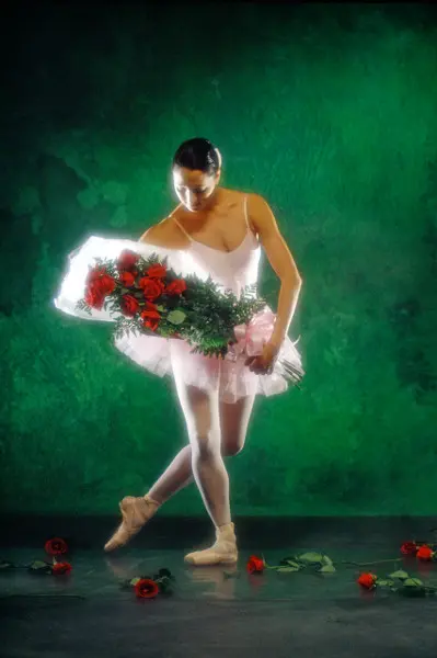 ballet-dancer-with-bouquet-of-flowers