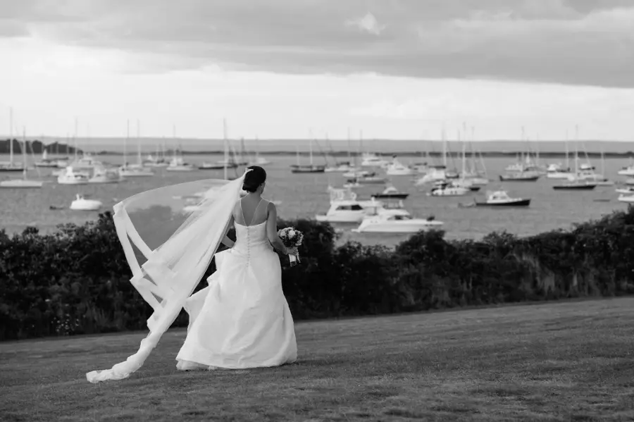 bride-overlooking-bay-with-boats