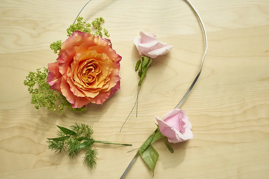 wrapping flowers onto wire