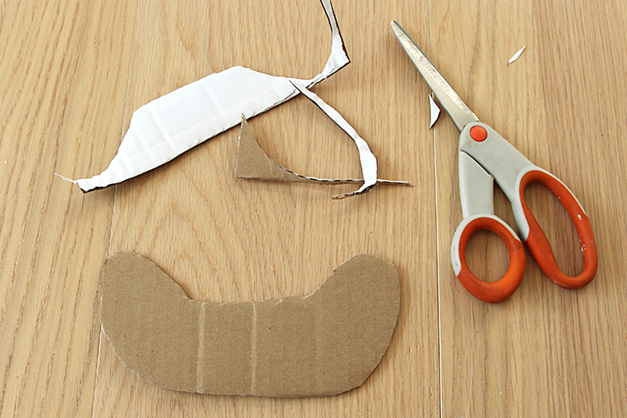 Flower Necklace Supplies: Cut cardboard with scissors