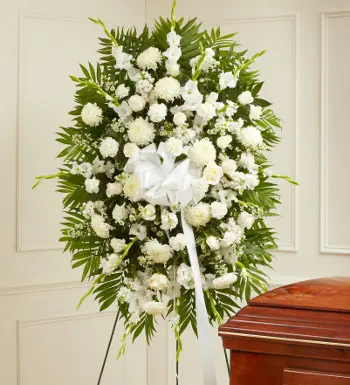 history of funeral flowers with a sympathy spray