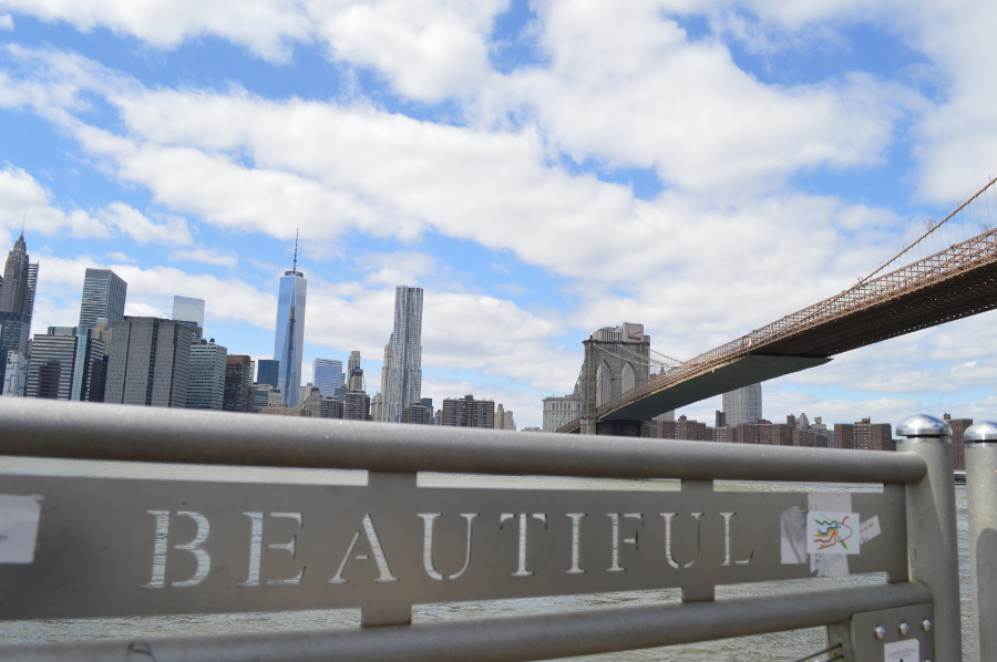 beautiful in different languages with nyc skyline