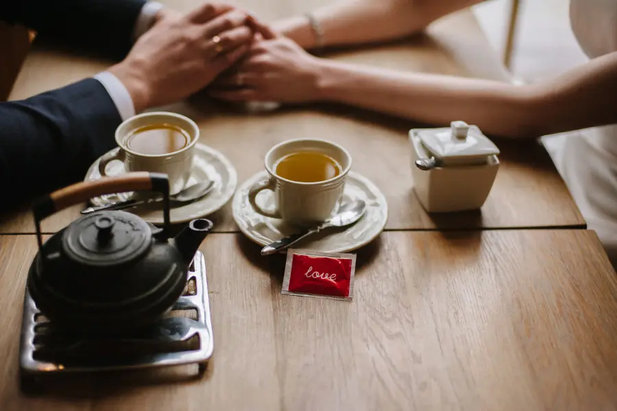 Couple Drinking Tea at Cafe