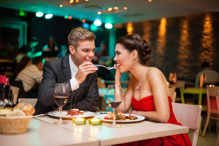 Couple Dining at Fancy Restaurant