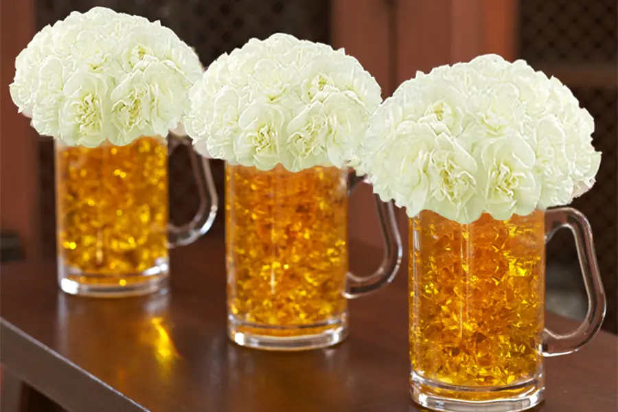 Beer Mug Flowers on a table.