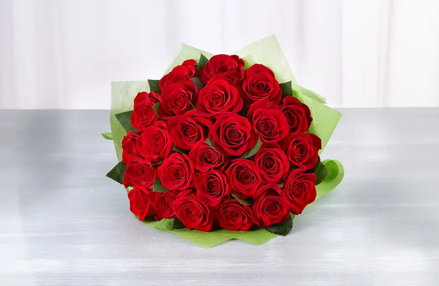 photo of wedding anniversary flowers with two dozen red roses