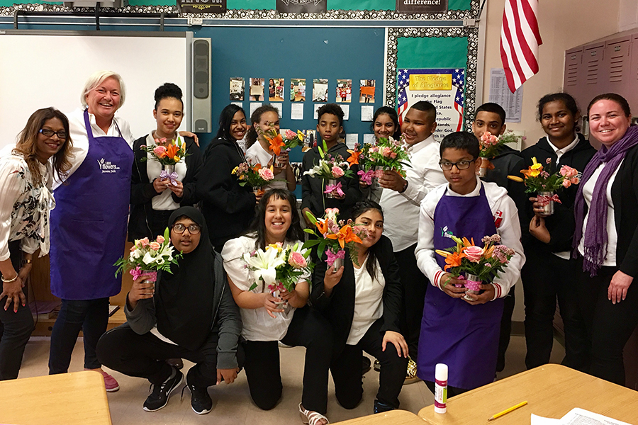 Group Photo with Flower Arrangements