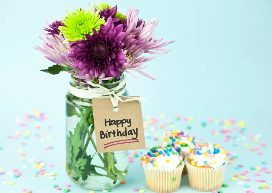 birthday trivia with flowers and cupcakes