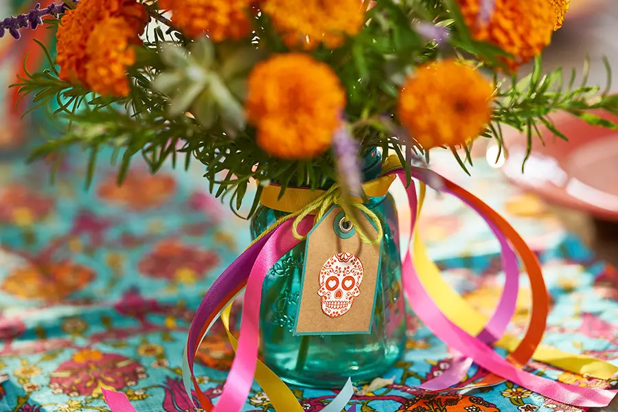 marigolds in day of the dead skull tag centerpiece