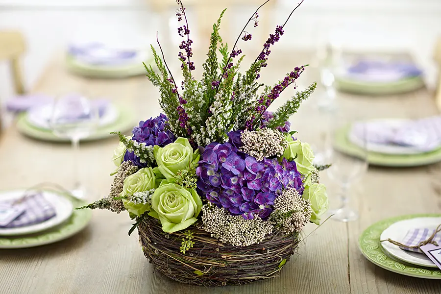 baby shower decor ideas with Oversized floral centerpiece with hydrangeas, rice flowers, waxflowers, roses, and solidago