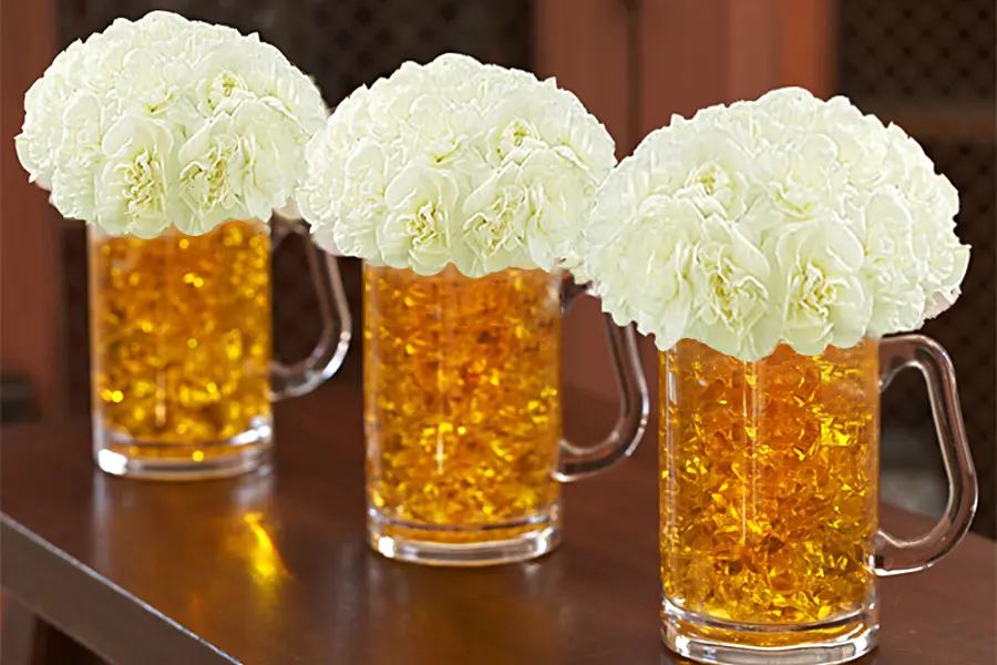 st. patrick's day decor with beer mug flowers