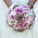 wedding traditions with bride holding her pink wedding bouquet