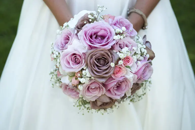 wedding traditions with bride holding her pink wedding bouquet