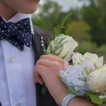 a photo of corsage and boutonniere: hero