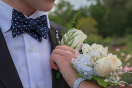 a photo of corsage and boutonniere: hero
