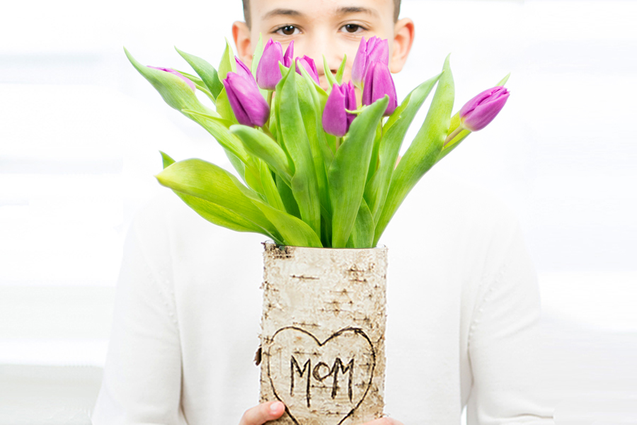 diy mother's day gift idea with by holding birch vase