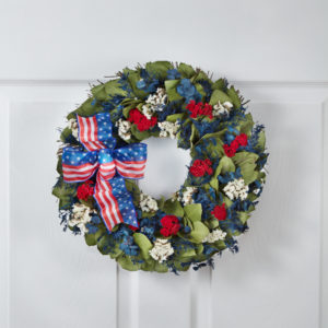patriotic flowers with red, white, and blue wreath