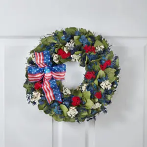 patriotic flowers with red, white, and blue wreath