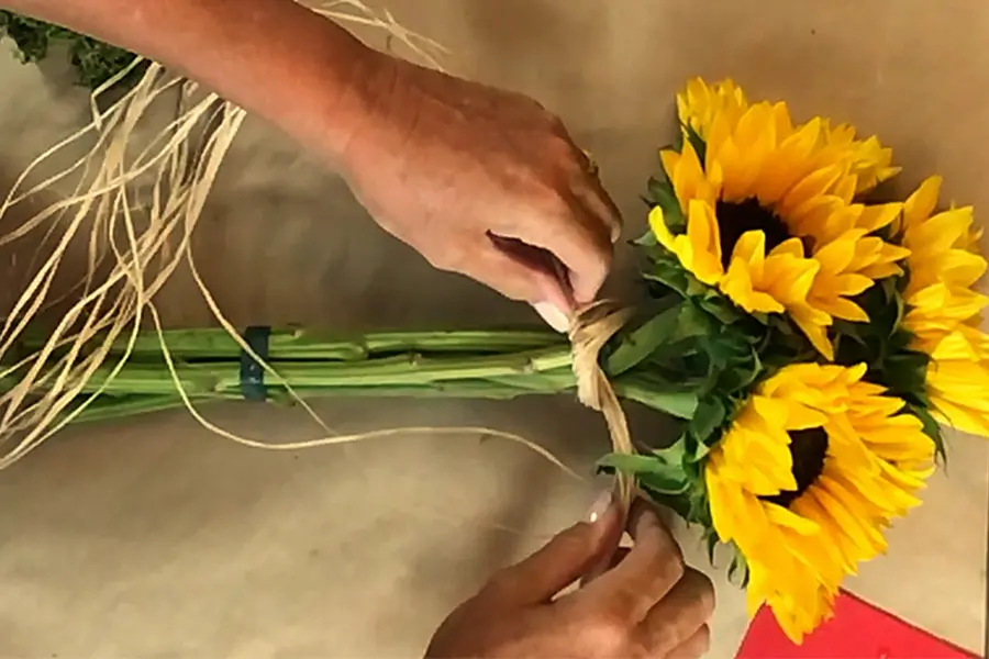 sunflower topiary with covering tape with raffia or ribbon