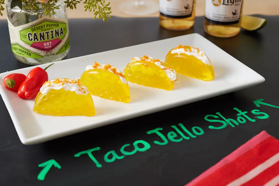 taco decor with taco jell-o shots on plate