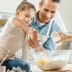 Dad and daughter cooking