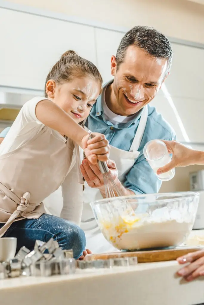 Dad and daughter cooking