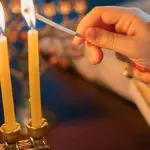 family activities for hanukkah with Lighting Menorah